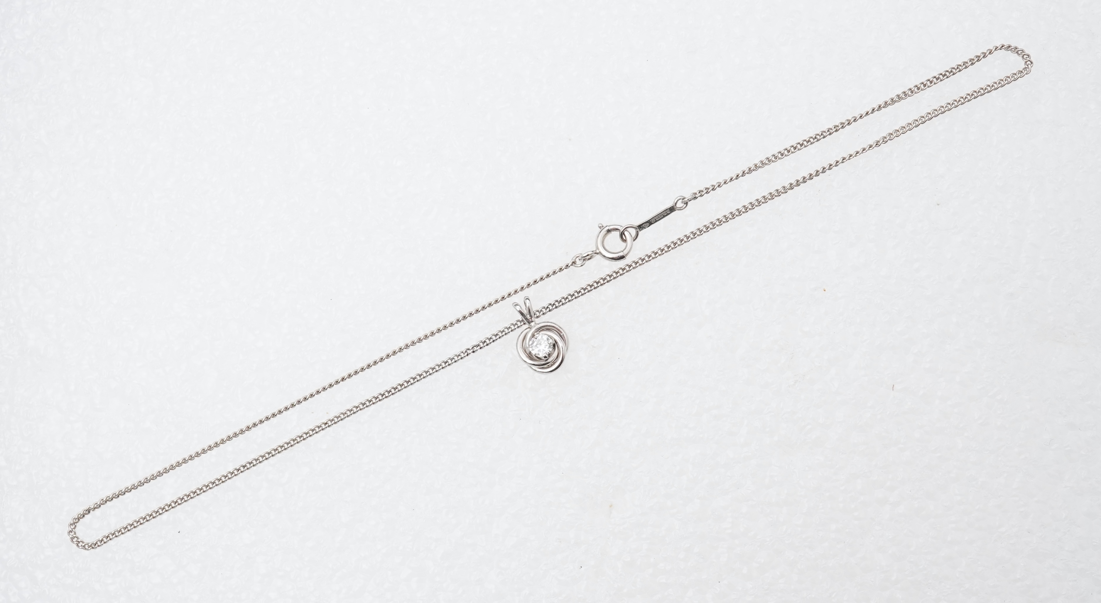 A diamond pendant necklace